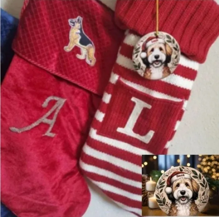 Doodle ornament hanging on red Christmas stockings