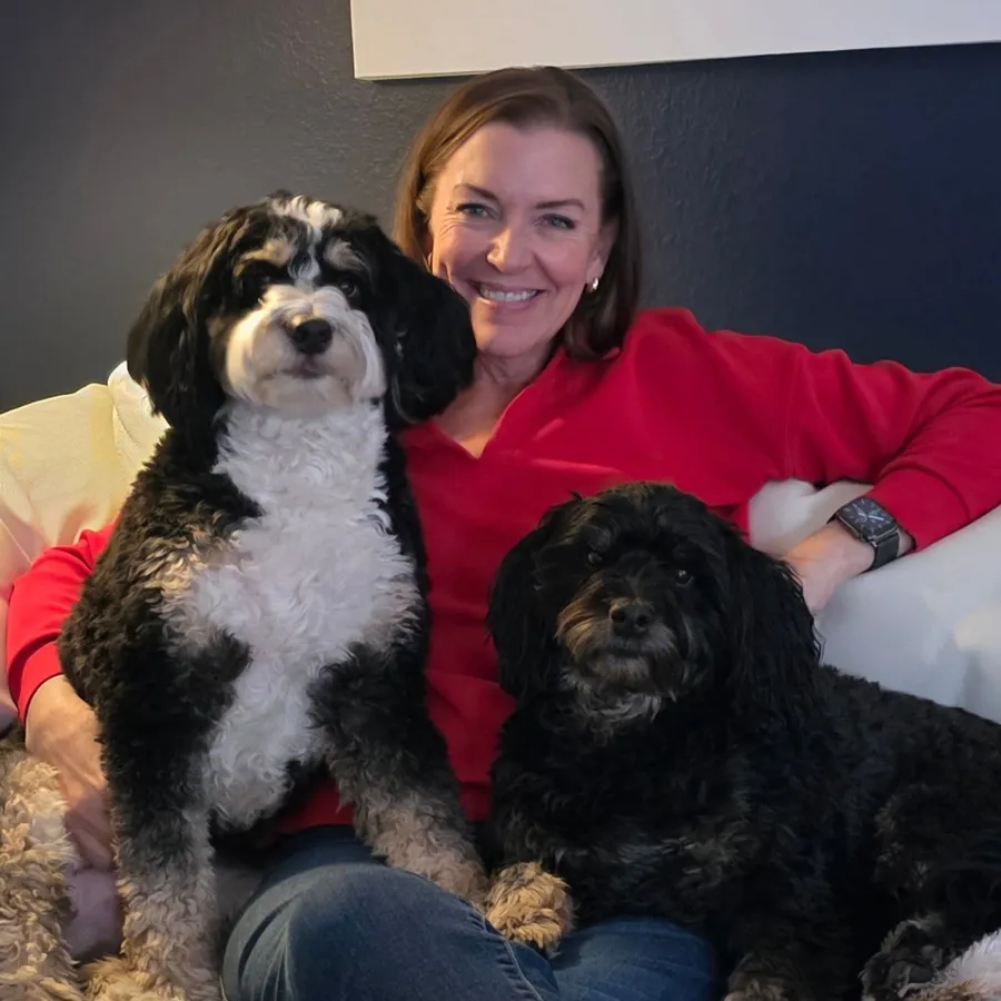 Mark’s wife on the couch with Bernie and Teddi