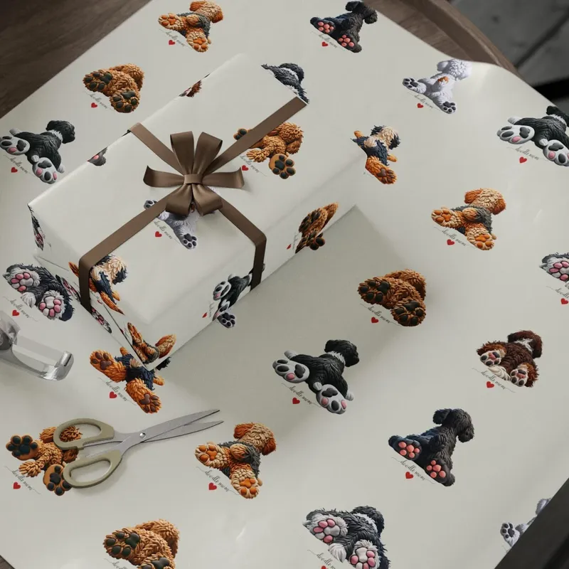 Cream wrapping paper patterned with doodle rear views showing paw pads and the words doodle mom